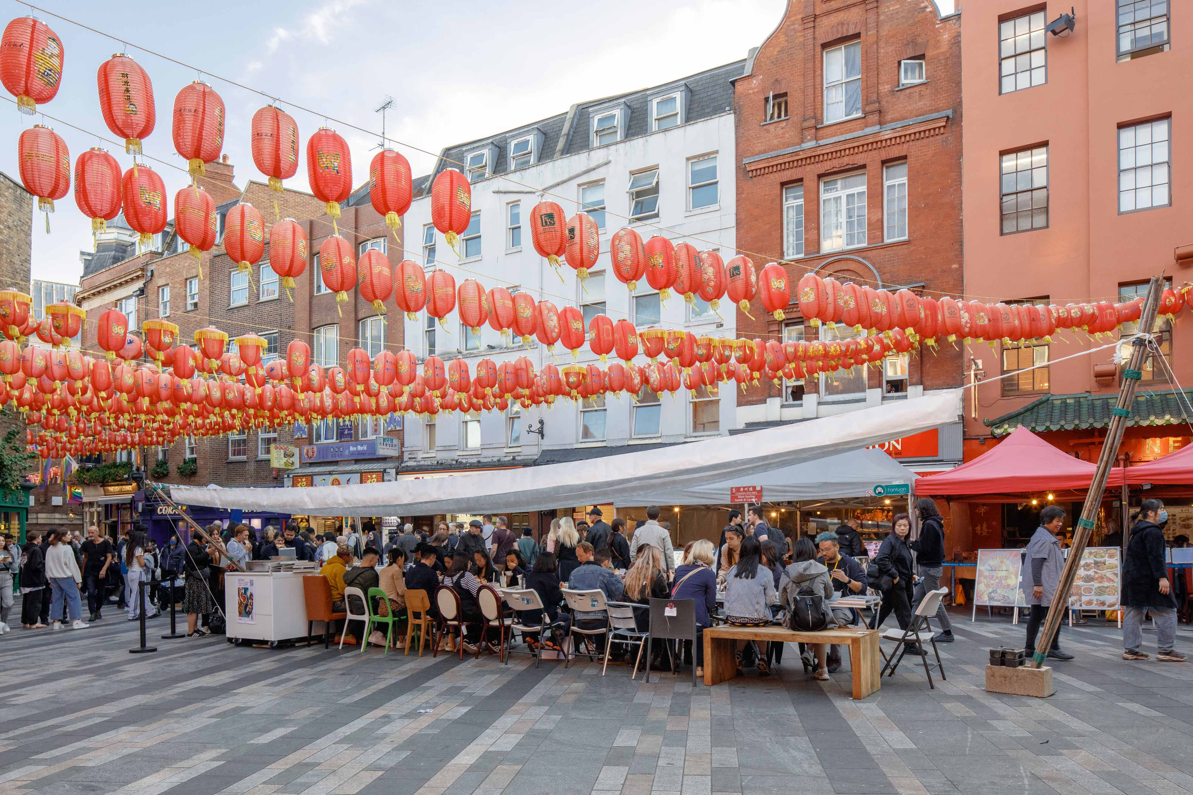 Low Carbon Chinatown sit-down meal under pleated tyvek canopy